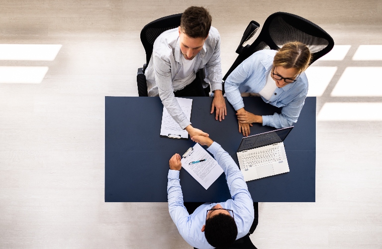 Family couple is consulting about estate planning with lawyer